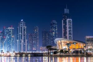 Skyline transition from Atlanta to Dubai showcasing distinct architectural differences